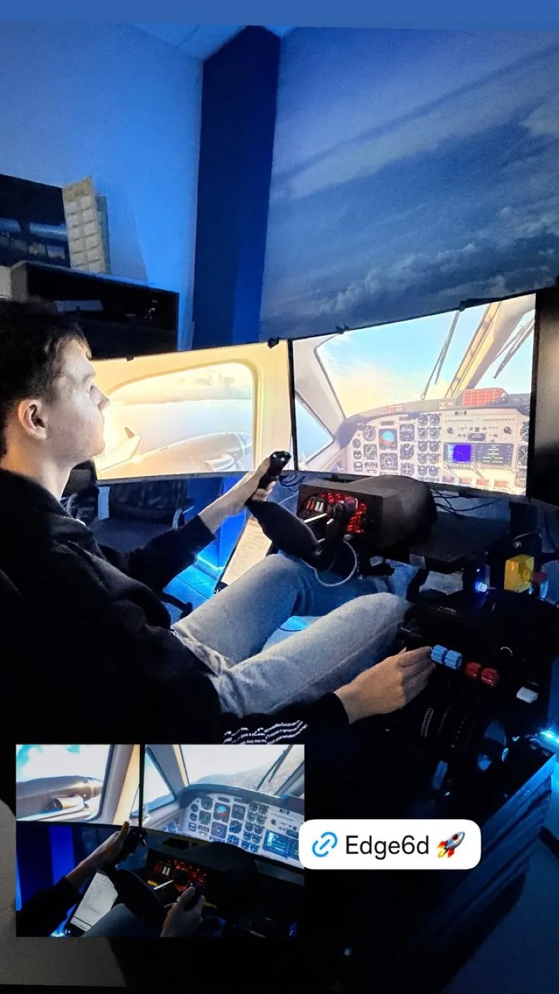 Pilot flying the Edge6D motion simulator with panoramic sky view